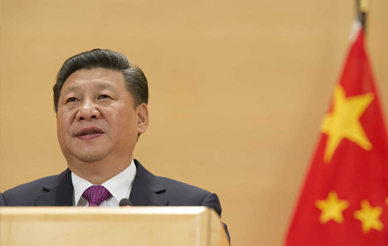 Photo of Xi Jinping with a flag of China in the background